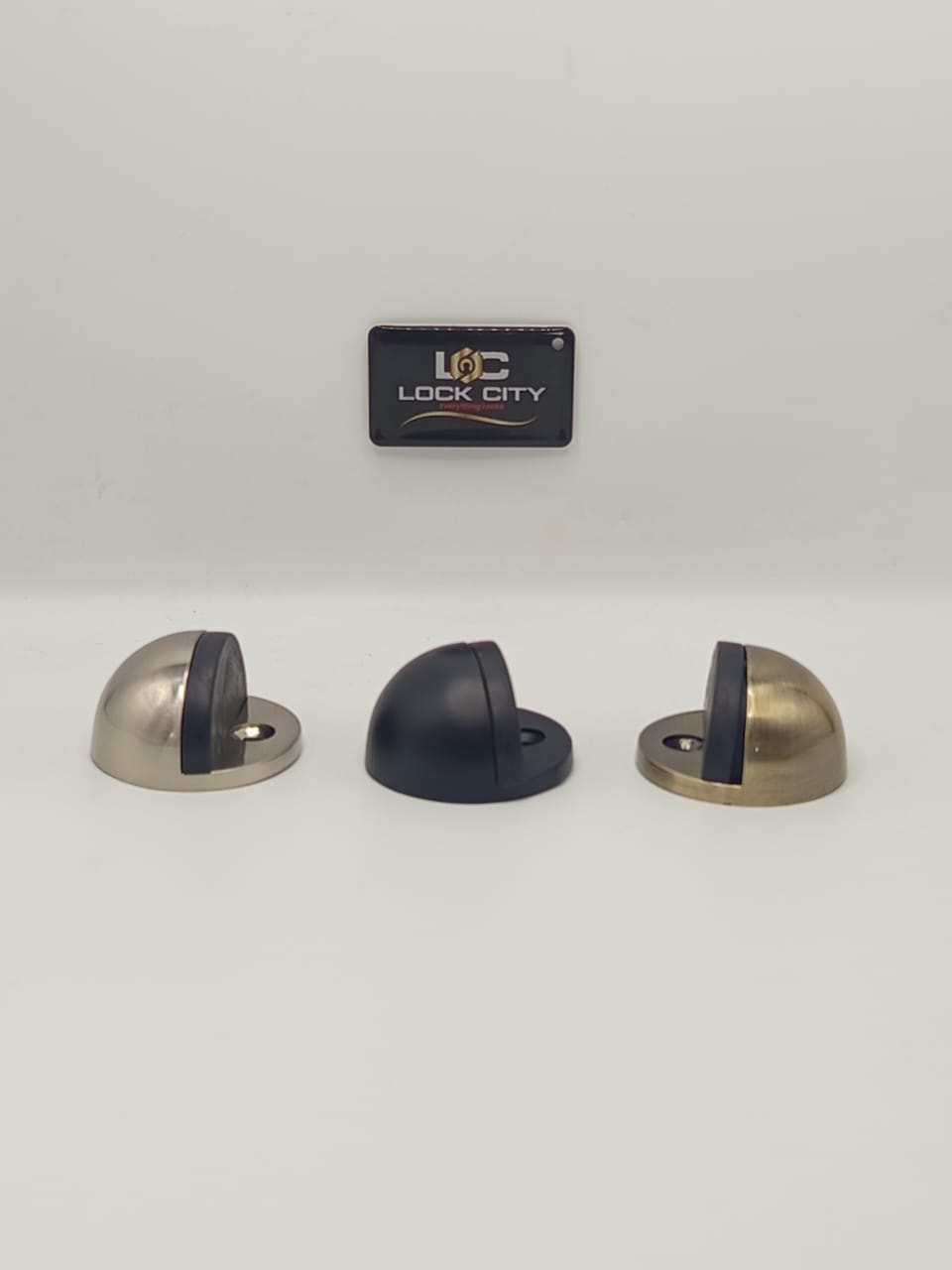 Half moon door stoppers